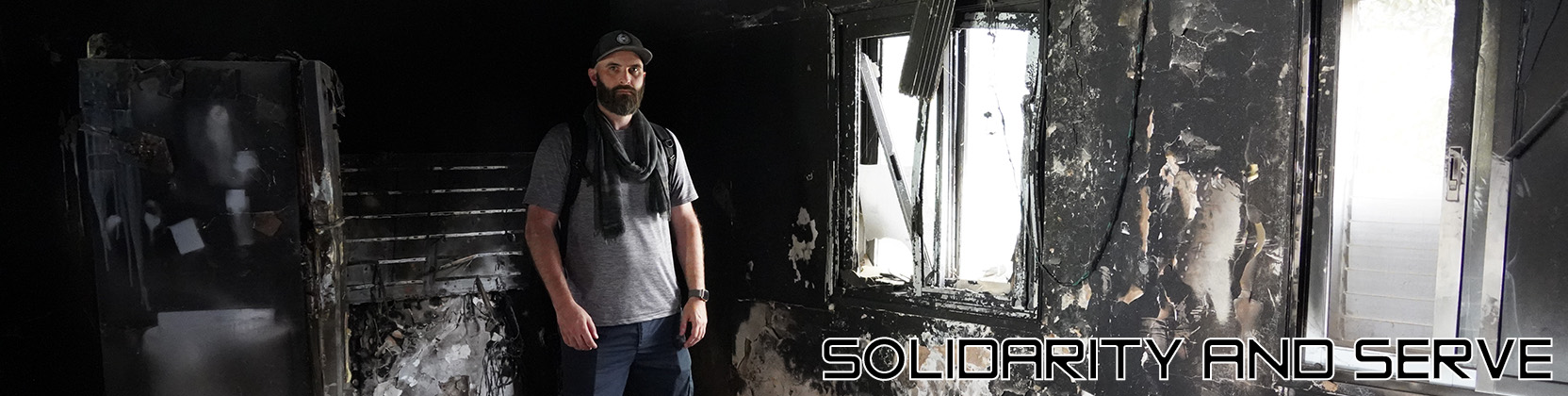 Solidarity and Serve Banner Ni